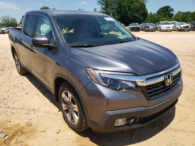 HONDA RIDGELINE 2017 with VIN 5FPYK2F51HB010942 - Photo from auction