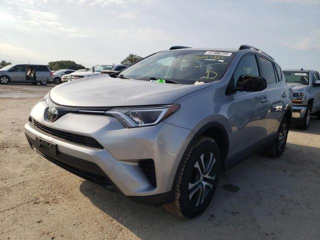 Photo 2 from auction – 2018 TOYOTA RAV4 LE with VIN 2T3BFREV1JW771533