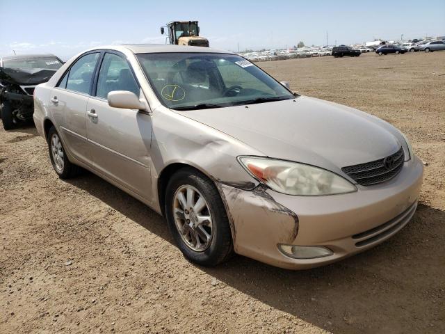 TOYOTA CAMRY LE 2003 with VIN 4T1BE30K93U758229 - Photo from auction