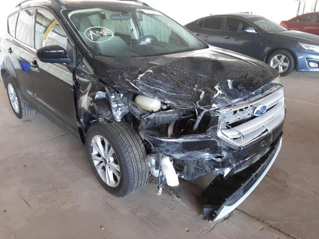 Photo 9 from auction – 2018 FORD ESCAPE SE with VIN 1FMCU0G9XJUC63690