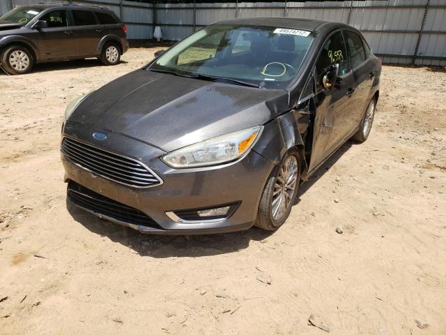 Photo 2 from auction – 2015 FORD FOCUS TITA with VIN 1FADP3J27FL238133