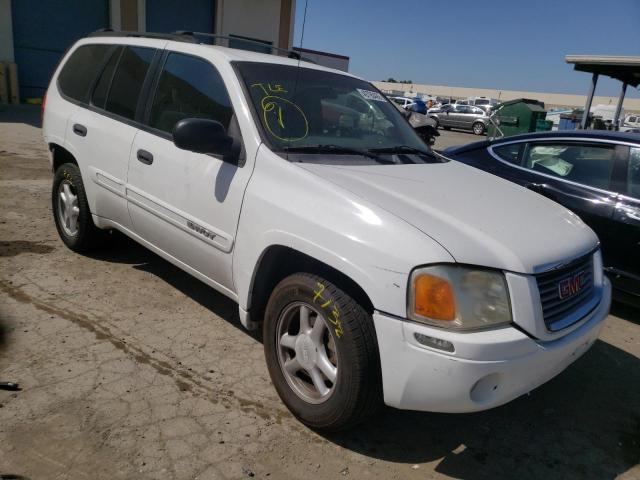 GMC ENVOY 2004 with VIN 1GKDS13S442112037 - Photo from auction