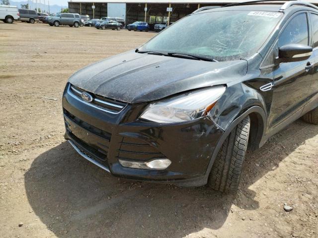 Photo 9 from auction – 2015 FORD ESCAPE TIT with VIN 1FMCU9J97FUB58092