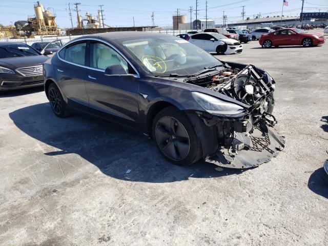 TESLA MODEL 3 2018 with VIN 5YJ3E1EB5JF186331 - Photo from auction