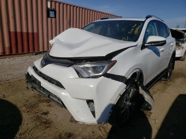 Photo 2 from auction – 2016 TOYOTA RAV4 XLE with VIN 2T3RFREV8GW475836