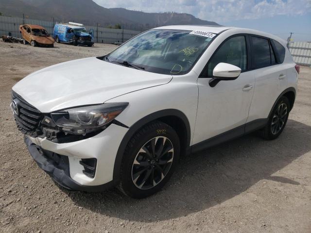 Photo 2 from auction – 2016 MAZDA CX-5 GT with VIN JM3KE2DY3G0802274