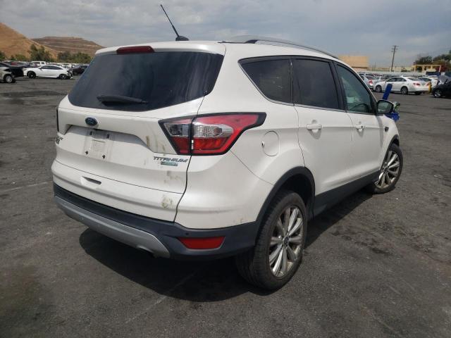 Photo 4 from auction – 2017 FORD ESCAPE TIT with VIN 1FMCU0J98HUB46659
