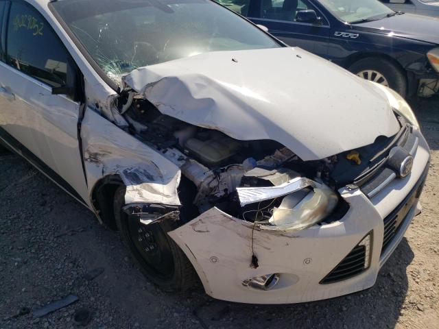 Photo 9 from auction – 2012 FORD FOCUS SEL with VIN 1FAHP3M2XCL410843