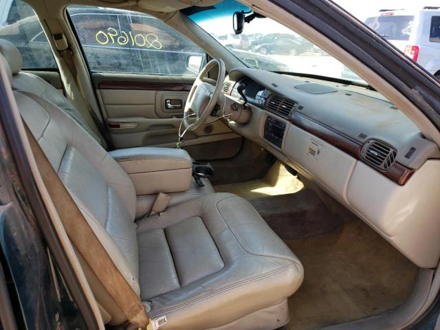 Photo 5 from auction – 1999 CADILLAC DEVILLE with VIN 1G6KD54Y2XU755537