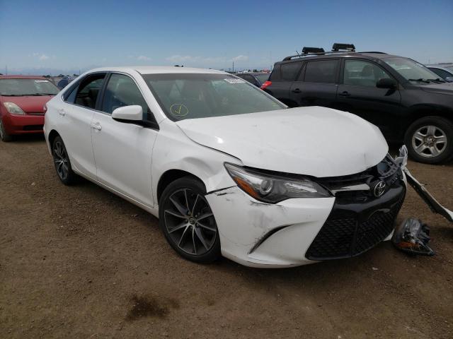 TOYOTA CAMRY LE 2017 with VIN 4T1BF1FK0HU672923 - Photo from auction