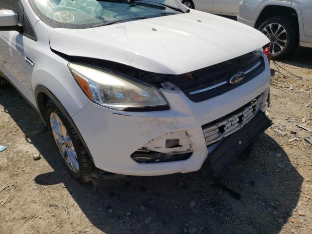 Photo 9 from auction – 2014 FORD ESCAPE SE with VIN 1FMCU9G99EUB53739