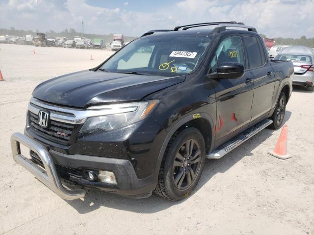 Photo 2 from auction – 2017 HONDA RIDGELINE with VIN 5FPYK2F10HB002926