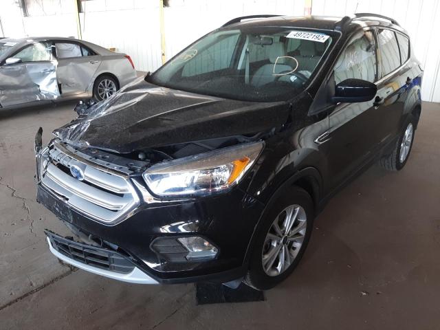 Photo 2 from auction – 2018 FORD ESCAPE SE with VIN 1FMCU0G9XJUC63690