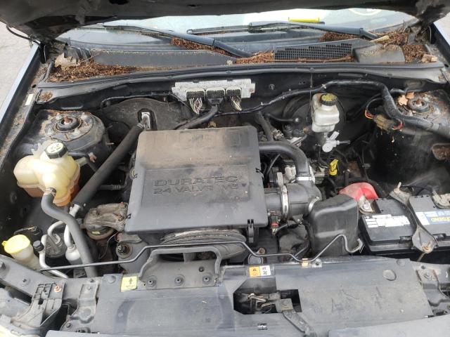 Photo 7 from auction – 2009 FORD ESCAPE LIM with VIN 1FMCU94G49KA85600