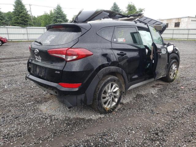 Photo 4 from auction – 2018 HYUNDAI TUCSON SEL with VIN KM8J3CA47JU618081