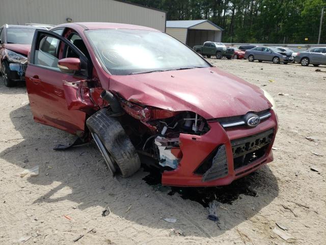 FORD FOCUS SE 2014 with VIN 1FADP3F20EL269117 - Photo from auction
