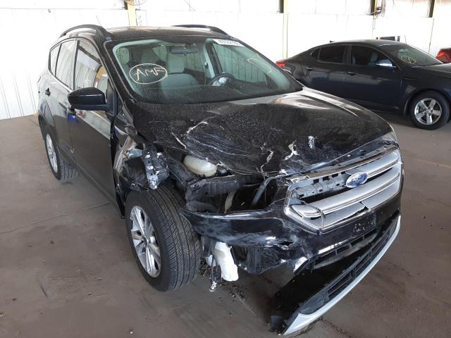 FORD ESCAPE SE 2018 with VIN 1FMCU0G9XJUC63690 - Photo from auction