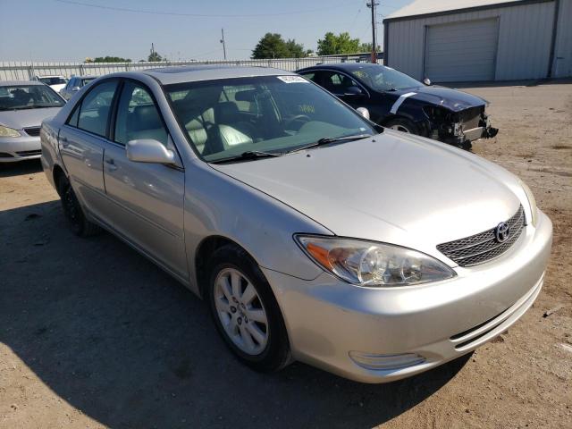 TOYOTA CAMRY LE 2002 with VIN 4T1BF30K72U021929 - Photo from auction