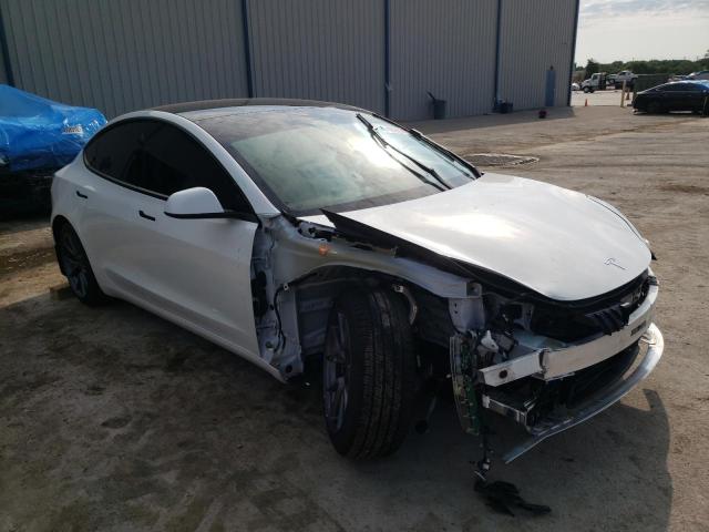 TESLA MODEL 3 2021 with VIN 5YJ3E1EAXMF062096 - Photo from auction