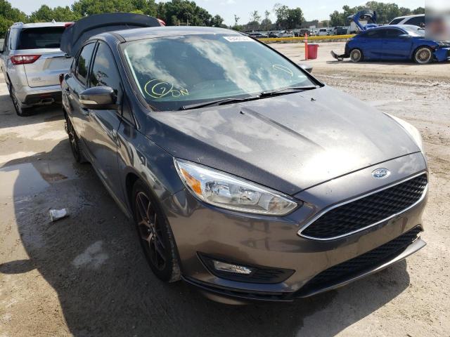 FORD FOCUS SE 2015 with VIN 1FADP3F20FL218685 - Photo from auction