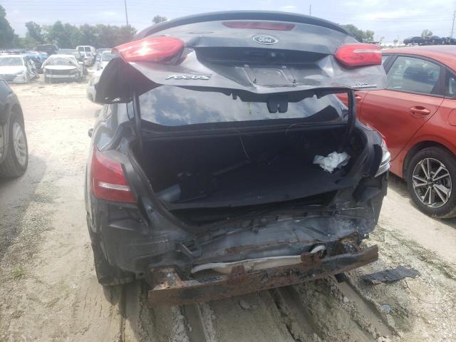 Photo 9 from auction – 2015 FORD FOCUS SE with VIN 1FADP3F20FL218685