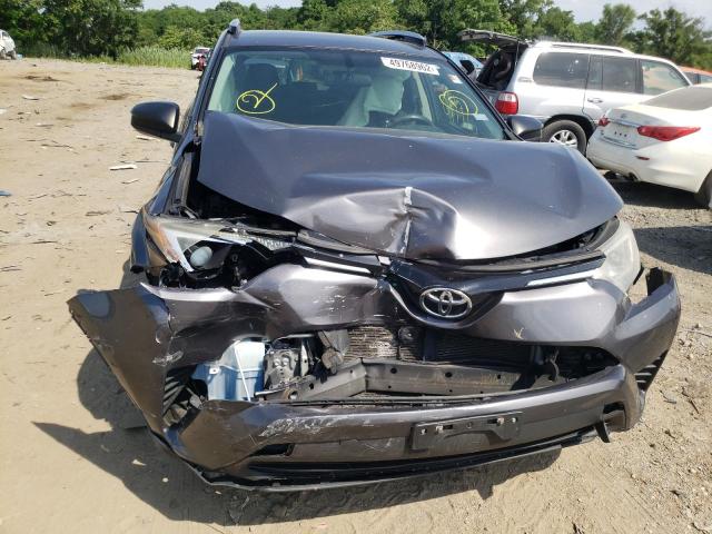 Photo 7 from auction – 2016 TOYOTA RAV4 LE with VIN JTMZFREV2GJ061143