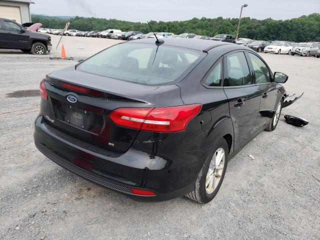 Photo 4 from auction – 2017 FORD FOCUS SE with VIN 1FADP3F2XHL328033