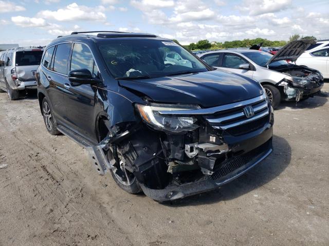 Photo 1 from auction – 2017 HONDA PILOT TOUR with VIN 5FNYF5H98HB010466