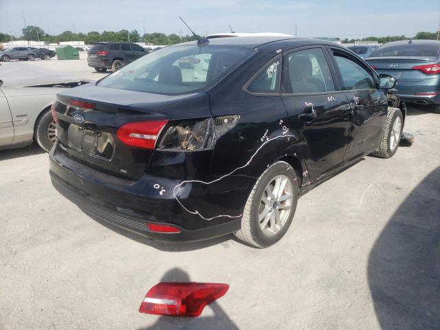 Photo 4 from auction – 2016 FORD FOCUS SE with VIN 1FADP3F20GL276961