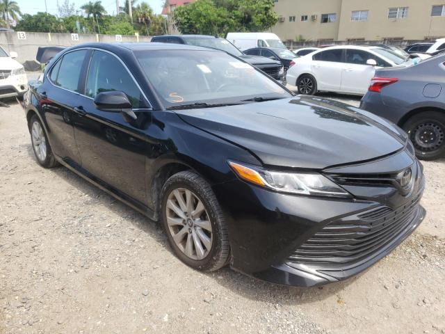 TOYOTA CAMRY LE 2020 with VIN 4T1C11AK2LU927607 - Photo from auction