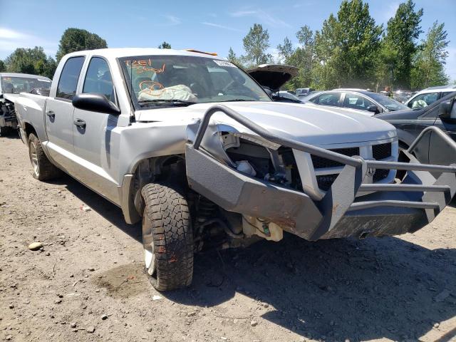 DODGE DAKOTA SLT 2011 with VIN 1D7RW3GK7BS611073 - Photo from auction