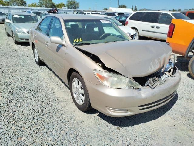 TOYOTA CAMRY LE 2002 with VIN 4T1BE30K32U042070 - Photo from auction