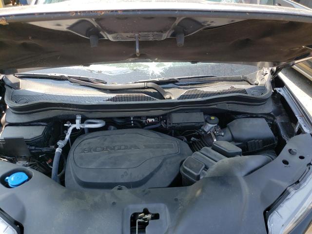 Photo 7 from auction – 2021 HONDA PASSPORT E with VIN 5FNYF7H54MB014016