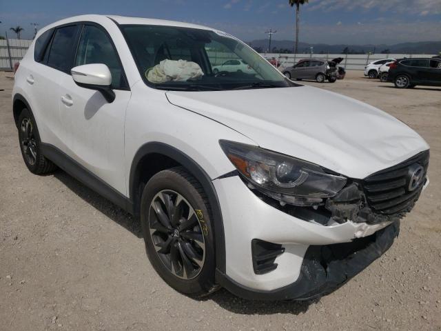MAZDA CX-5 GT 2016 with VIN JM3KE2DY3G0802274 - Photo from auction