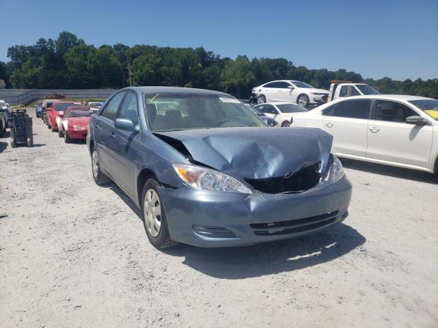 TOYOTA CAMRY LE 2004 with VIN 4T1BE32K54U869309 - Photo from auction