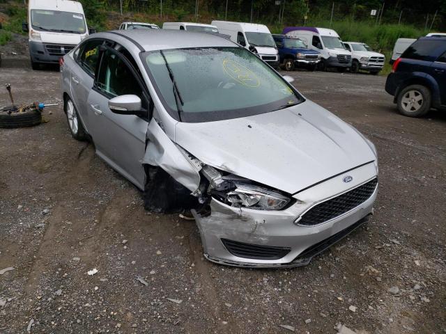 FORD FOCUS SE 2016 with VIN 1FADP3F29GL334808 - Photo from auction