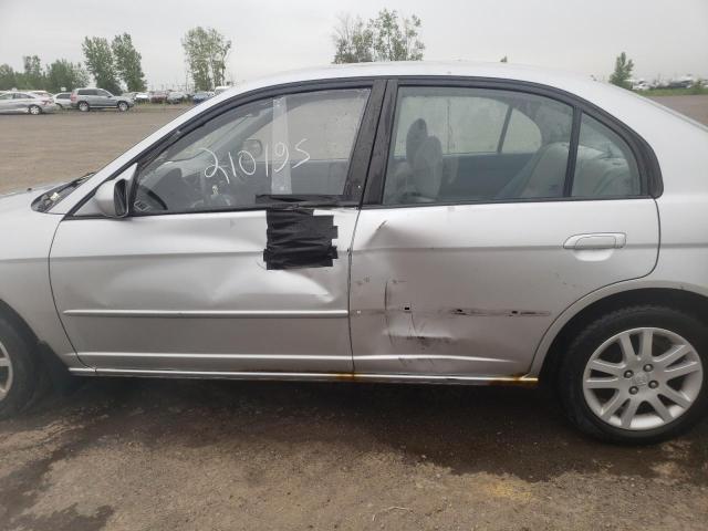 Photo 9 from auction – 2003 HONDA CIVIC LX with VIN 2HGES16643H947884