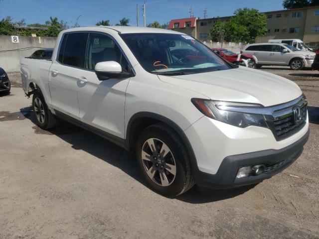 HONDA RIDGELINE 2017 with VIN 5FPYK2F62HB004057 - Photo from auction