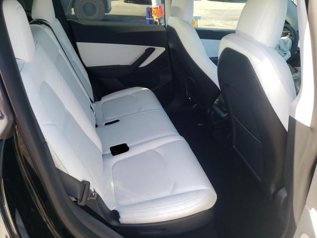 Photo 6 from auction – 2022 TESLA MODEL Y with VIN 7SAYGAEE0NF312906