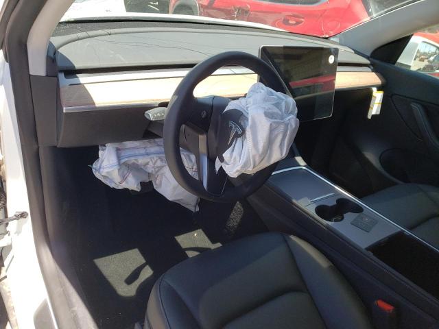 Photo 9 from auction – 2021 TESLA MODEL Y with VIN 5YJYGDEE9MF270863