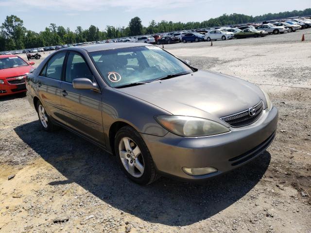 TOYOTA CAMRY LE 2003 with VIN 4T1BF30K73U556048 - Photo from auction