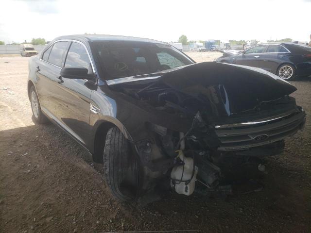 FORD TAURUS SE 2015 with VIN 1FAHP2D80FG112796 - Photo from auction