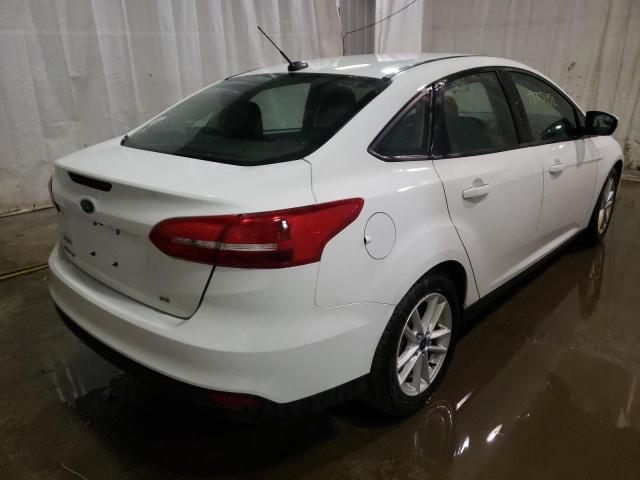 Foto 4 de la subasta – 2017 FORD FOCUS SE con VIN 1FADP3F27HL250911