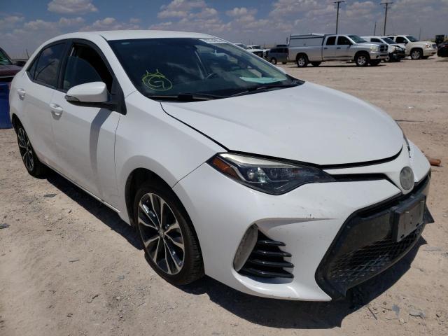 TOYOTA COROLLA L 2017 with VIN 5YFBURHE0HP607003 - Photo from auction