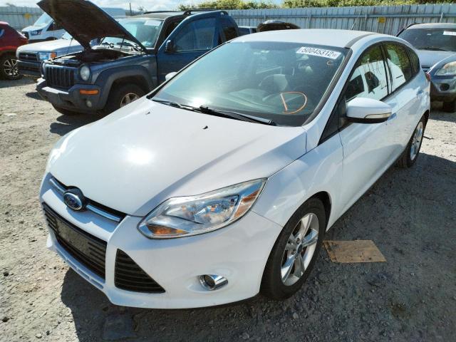 Photo 2 from auction – 2012 FORD FOCUS SE with VIN 1FAHP3K24CL243074