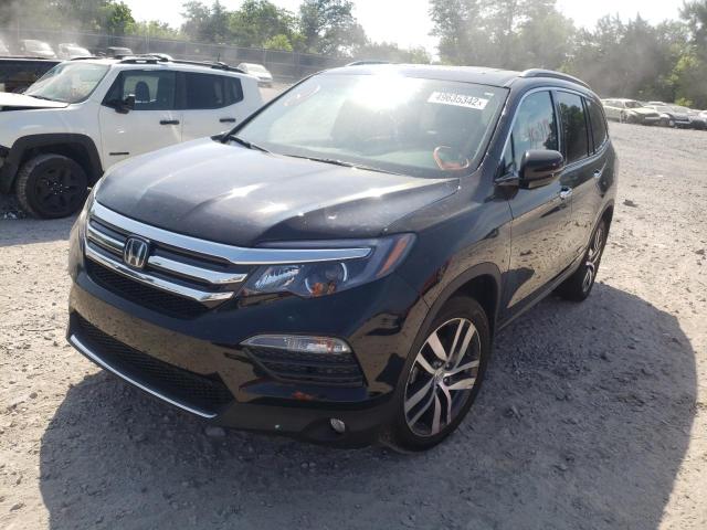 Photo 2 from auction – 2017 HONDA PILOT TOUR with VIN 5FNYF6H90HB093784