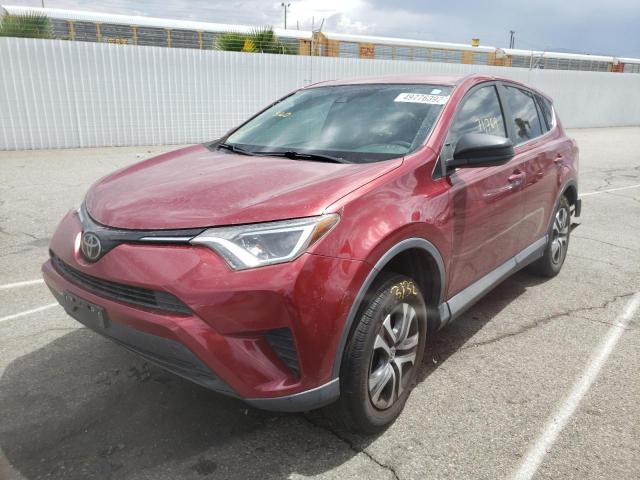 Photo 2 from auction – 2018 TOYOTA RAV4 LE with VIN 2T3ZFREV4JW411848