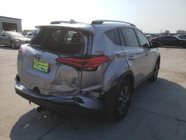 Photo 4 from auction – 2018 TOYOTA RAV4 LE with VIN 2T3BFREV5JW784964
