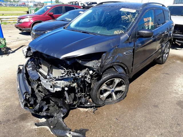 Photo 2 from auction – 2017 FORD ESCAPE SE with VIN 1FMCU0GD0HUA37883