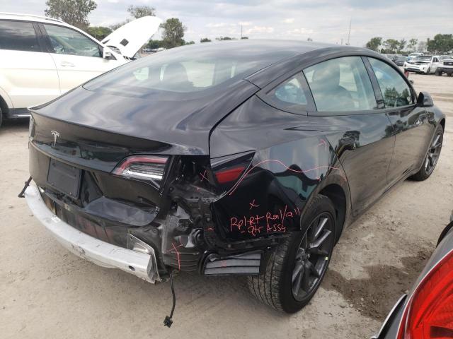 Photo 4 from auction – 2021 TESLA MODEL 3 with VIN 5YJ3E1EA9MF092805